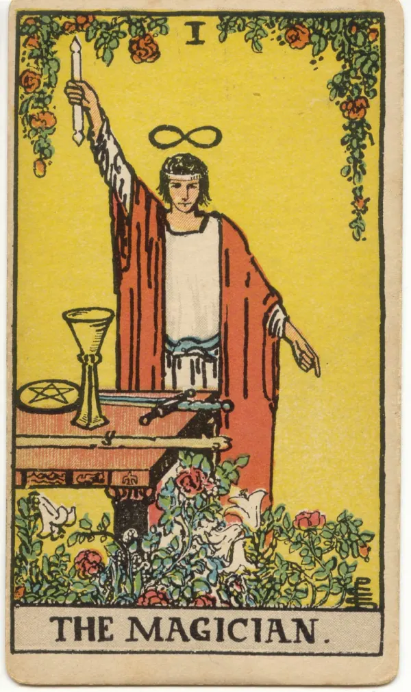 The Magician: a figure beside a table of tools
